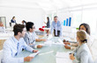 © Rawpixel.com - Group of Business People Meeting in Office