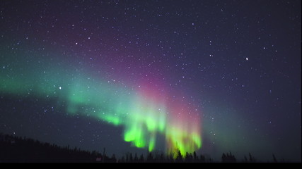 timelapse of northern lights over alaska