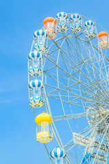 Wall Mural - Amusement ferris wheel in the park