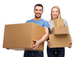 © Syda Productions - smiling couple holding cardboard boxes