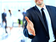 © ASDF - Businessman offering a handshake