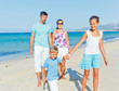 © Max Topchii - family having fun on beach