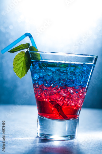 Nowoczesny obraz na płótnie Layered cocktail with blue and red