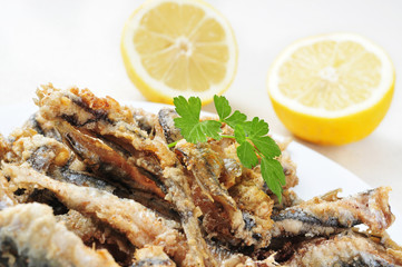 Wall Mural - spanish boquerones fritos, battered and fried anchovies typical