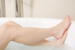 © TAGSTOCK2 - legs of woman taking a bath