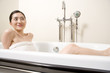 © TAGSTOCK2 - woman taking a bath