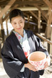 © TAGSTOCK2 - woman in yukata coming to hot spring