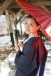© TAGSTOCK2 - woman in yukata holding Japanese-style umbrella