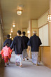 © TAGSTOCK2 - three-generation family in yukata coming to hot spring