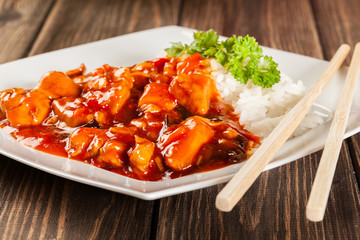 Wall Mural - Sweet and sour chicken with rice