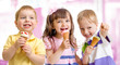 © Andrey Kuzmin - happy children or kids group with ice cream