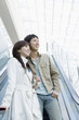 © TAGSTOCK2 - couple going down by the escalator