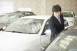 © TAGSTOCK2 - male salesclerk of car dearlership