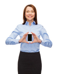 Canvas Print - smiling businesswoman with smartphone blank screen