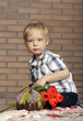 © natalinka29 - Young boy with a bouquet of flowers