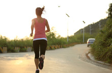 Healthy Asian Woman Runner Running Outdoor Under Sunrise