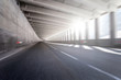 © mRGB - Empty tunnel road with motion blur