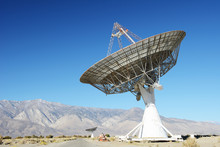 Satellite Dishes In Desert / Clear Blue Sky