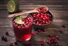 Cranberry Juice On Old Wooden Table
