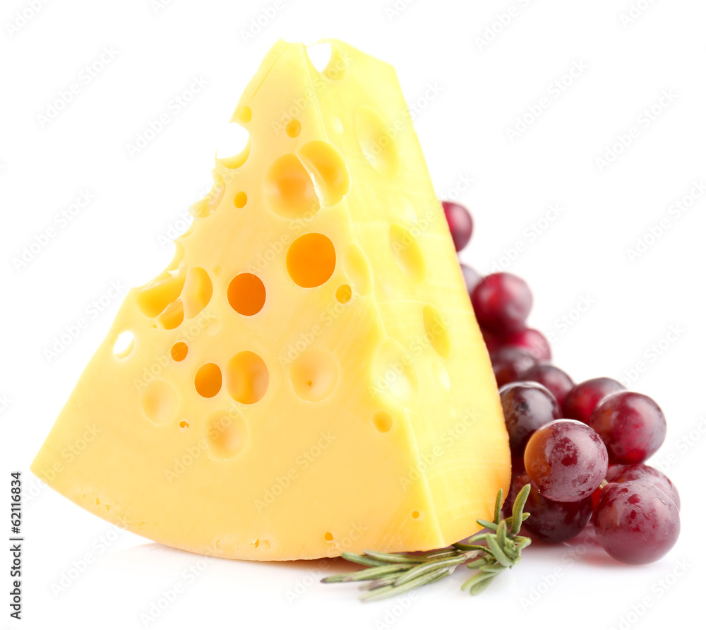 Piece of cheese with grape and rosemary, isolated on white