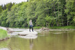 © Richard Semik - woman fishing in Sazava river, Czech Republic