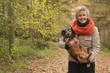 © DNF-Style - Middle aged woman is carry the dog