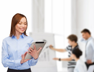 Sticker - smiling woman looking at tablet pc at office