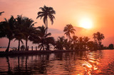 Fototapeta Zachód słońca - Sunrise over the backwaters in Kerala, India