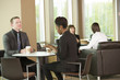 © digitalcafe - employees drinking coffee in the break room