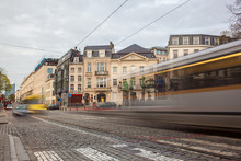 Tramway In Motion On The Street Of Brussels Near The Sablon Squa