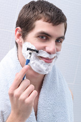 man shaves