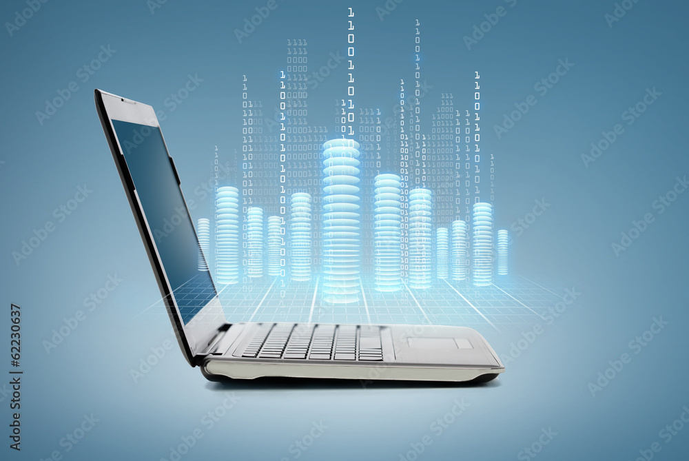 laptop computer with digital coins and data