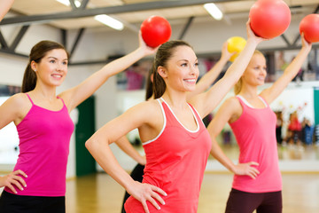 Wall Mural - group of people working out with stability balls