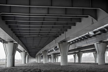 Dark Urban Scene Under Modern Automotive Bridge