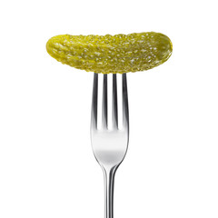 marinated pickled cucumber on a fork isolated on a white backgro