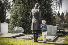 Mother And Child At Graveyard