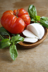 Tomato, mozzarella and green basil