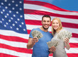 © Syda Productions - smiling couple holding dollar cash money