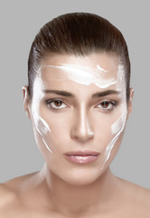 Wall Mural - beautiful spa girl with cream on her face. skincare concept