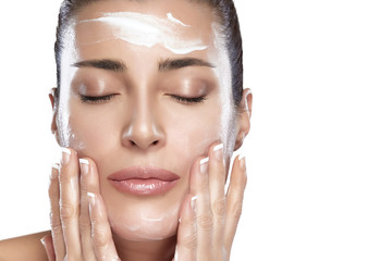 Beautiful Spa Girl with Cream on Her Face. Skincare concept