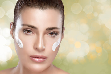 Wall Mural - spa girl with cream on her face. skincare concept