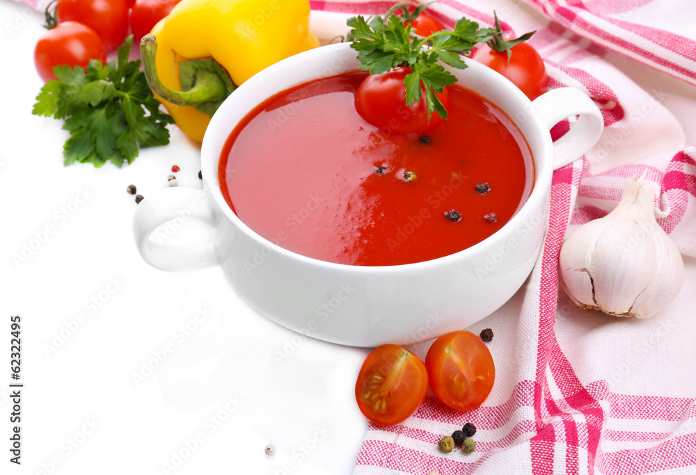 Tasty tomato soup and vegetables, isolated on white