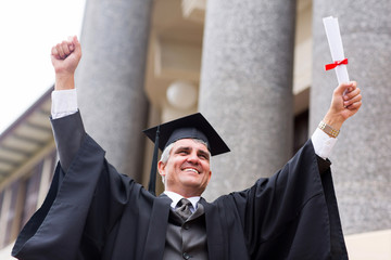 excited middle aged university graduate