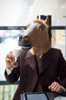 © Eugenio Marongiu - young stylish man lifestyle horse mask