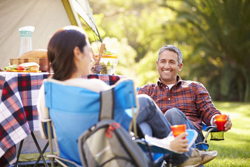 Wall Mural - Couple Enjoying Camping Holiday In Countryside