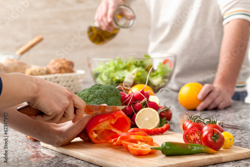 Fotomural Cutting a vegetables for salad