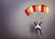 © SFIO CRACHO - businessman with parachute