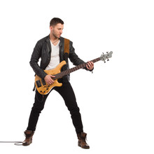 Male Guitarist With Bass Guitar.