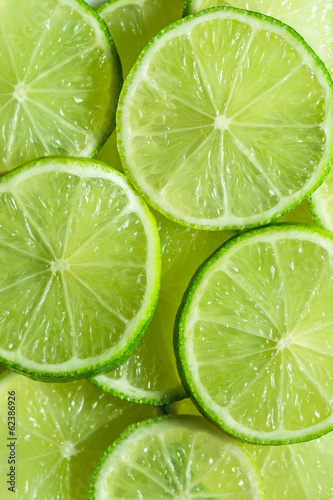 Fotoboard na płycie Tło plasterki limonki.