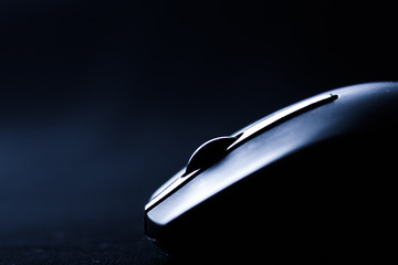 The mouse with a wheel on a black background
